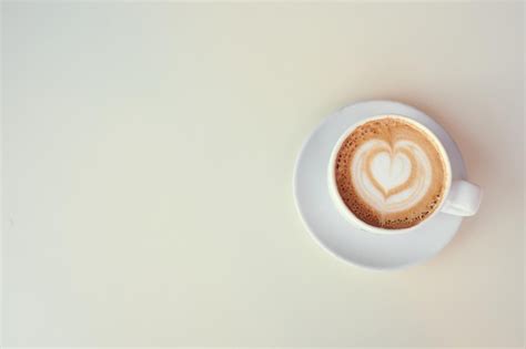 premium photo   shot  coffee cup  white background