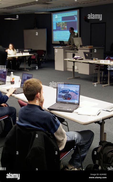 Adult Computer Class Training Is Conducted During A Business Meeting
