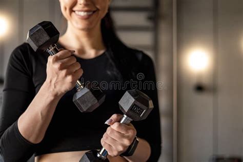 Portrait Happy Athletic Brunette Woman Posing At Mirror Holding Dumbbells Smiling Healthy