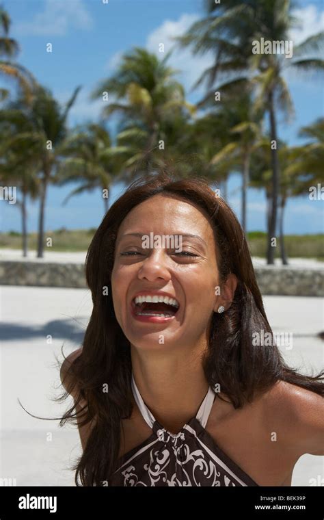 Portrait Of A Mature Woman Laughing On The Beach South Beach Miami