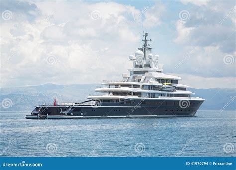 luxury large super  mega motor yacht   blue sea stock photo