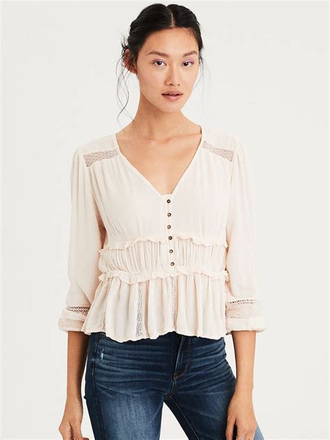 Buy AMERICAN EAGLE OUTFITTERS Women Beige Solid Peplum Top - Tops for ...