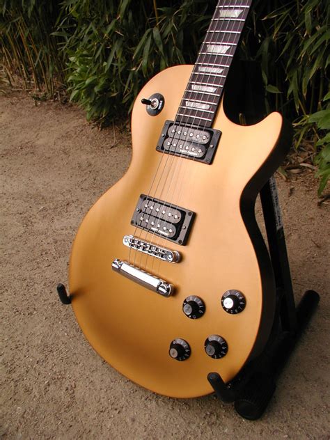 Gibson Les Paul 70s Tribute W Min Etune Gold Topdark Back Image