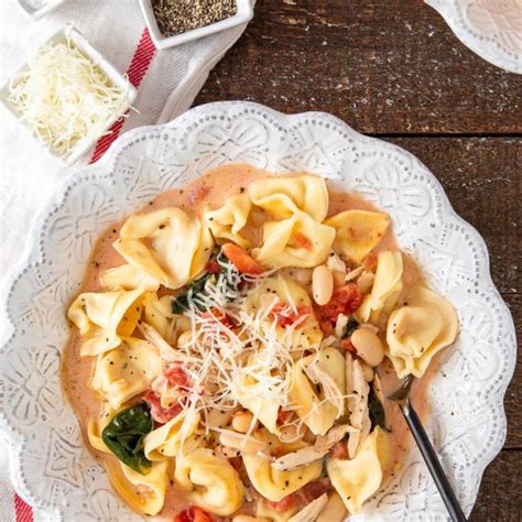 Creamy Tuscan Tortellini Soup Cooking On The Front Burner