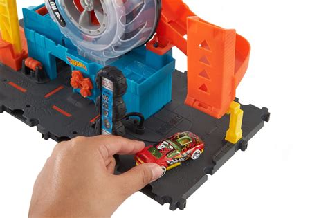 Hot Wheels City Super Twist Tire Shop Playset Spin The Key To Make Cars Travel Through The