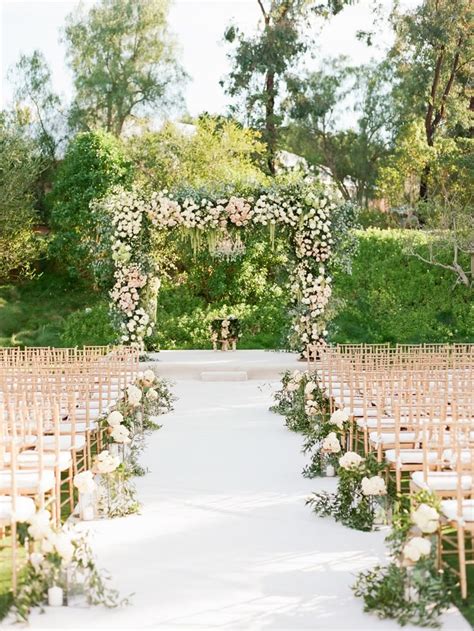 Luxe Santa Fe Wedding With A Lush Floral Chuppah Wedding Aisle
