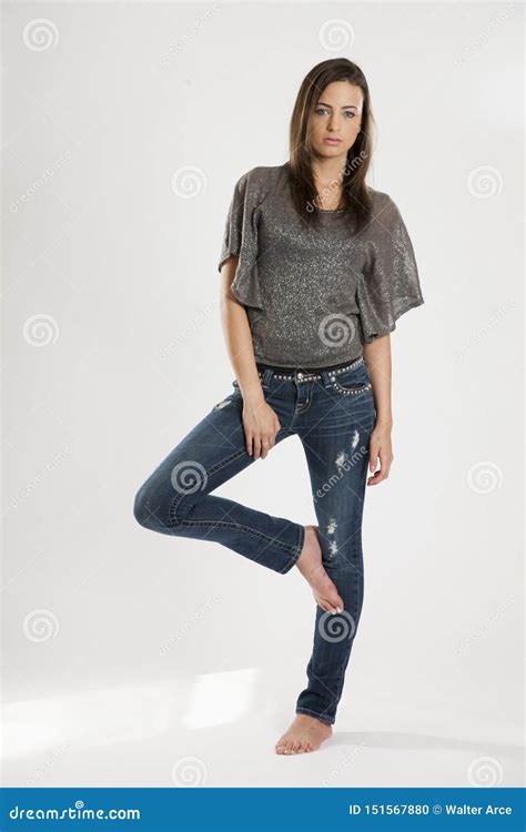Lovely Long Haired Brunette Model Posing In A Studio Environment Stock