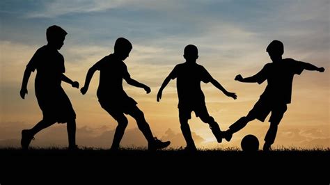 Premium Photo Silhouette Of Children Play Soccer Football