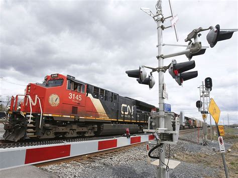 cn rail cuts earnings outlook  signal economy  slowing financial post