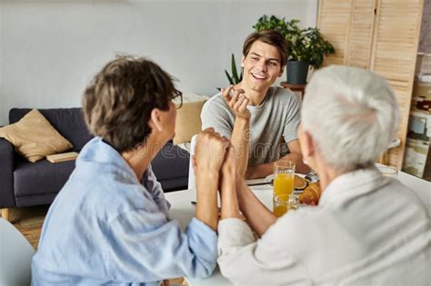 Lesbian Parents Share A Warm Breakfast Stock Image Image Of Sharing Lgbtq