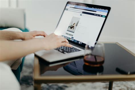 person  macbook laptop  stock photo