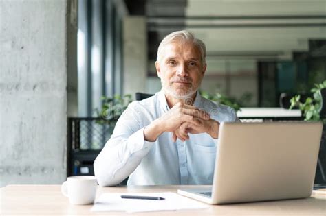 Happy Mature European Business Man Ceo Trader Using Computer Typing