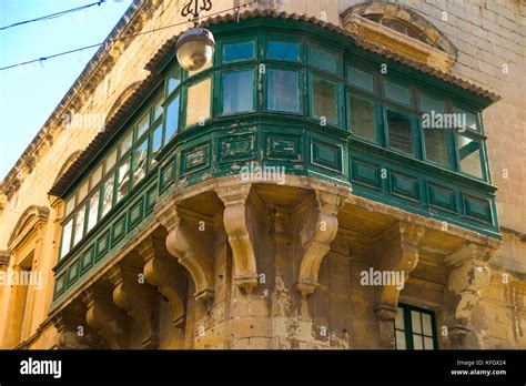 Traditional Closed Wooden And Glass Wood And Glazed Maltese Balcony Gallariji Above The