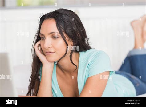 Pretty Brunette Using Her Laptop Stock Photo Alamy