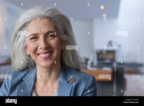 Portrait Smiling Confident Mature Woman Stock Photo Alamy