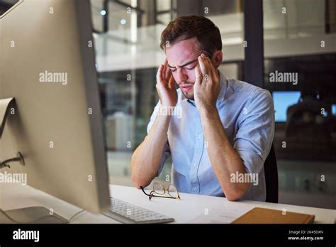 Stress Depression And Mental Health For Night Business Man Sitting At His Computer Desk With