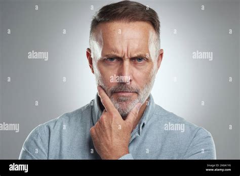 Struggling To Come Up With A Solution Studio Portrait Of A Mature Man