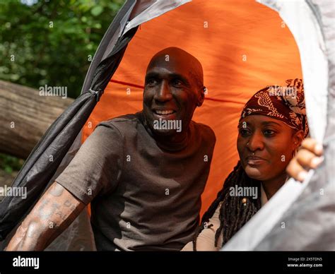 Mature Couple Relaxing In Tent After Hike Stock Photo Alamy