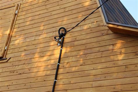 Как правильно завести кабель СИП в дом: монтаж провода от столба к дому ...