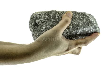 Close Up Hand Is Holding Stone At White Background Stock Photo Image