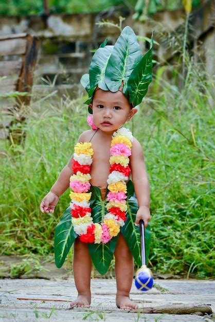 Premium Photo Portrait Of Cute Boy Wearing Leaves And Garland