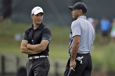 Tiger Woods to fly solo by ending partnership with golf swing coach ...