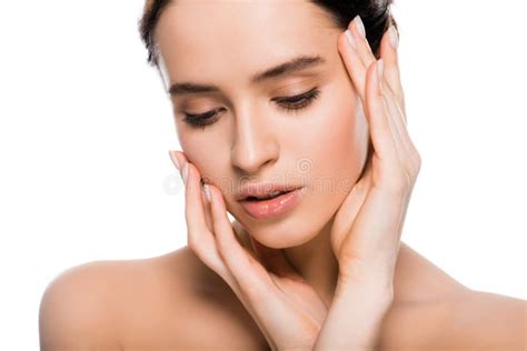 Naked And Brunette Girl With Amazing Blue Eyes Is Covered With Leaves Posing Among Leaves Of