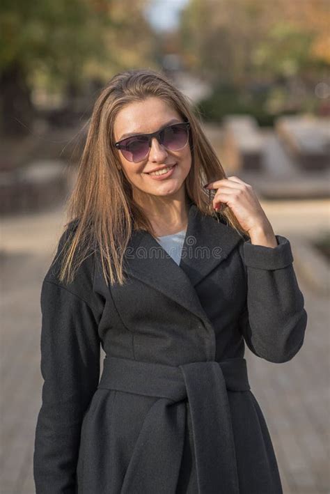 Beautiful And Cute Blonde Girl With Pleasure Posing On The Street Stock Image Image Of Luxury