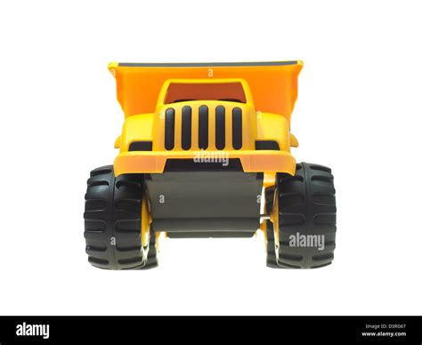 A toy dump truck isolated against a white background Stock Photo - Alamy