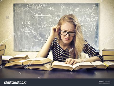 Beautiful Blonde Girl Concentrated While Studying Stock Photo Shutterstock