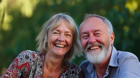 Premium Photo Cheerful Mature Pair In Tender Embrace