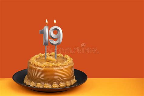Birthday Cake With Dulce De Leche Frosting Candle Number 19 Stock
