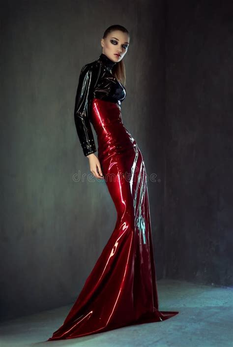 Beautiful Brunette Woman In Red And Black Latex Stock Image Image Of Style Clothing