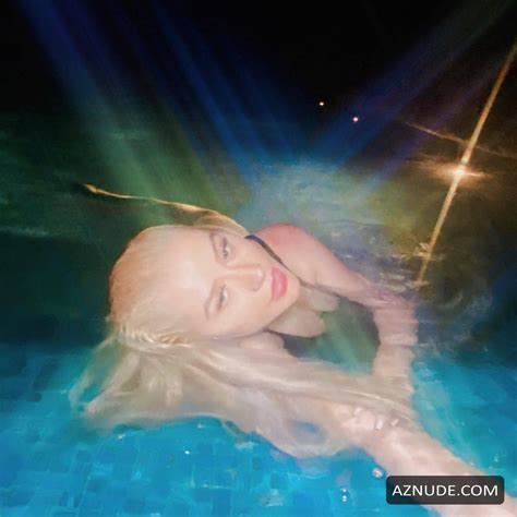 Christina Aguilera Displays Her Tits While Swimming In One Piece In The Pool For Her Social