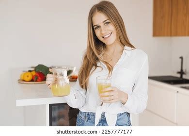 Happy Cute Blonde Woman Drinks Orange Stock Photo Shutterstock