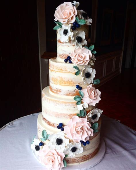 Beautiful Naked Cake With Sugar Roses And Blueberries