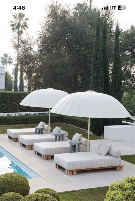 Modern Backyard with Outdoor Pool and Lounge Chairs