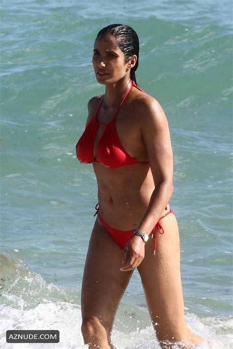 Padma Lakshmi Sexy In A Revealing Red Bikini While Going For A Dip On Miami Beach Aznude