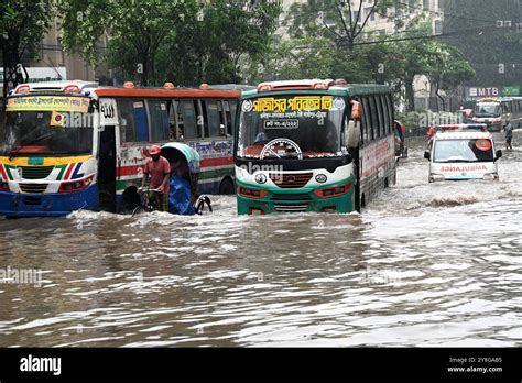 Vehicles And Rickshaws Try Driving With Passengers Through The