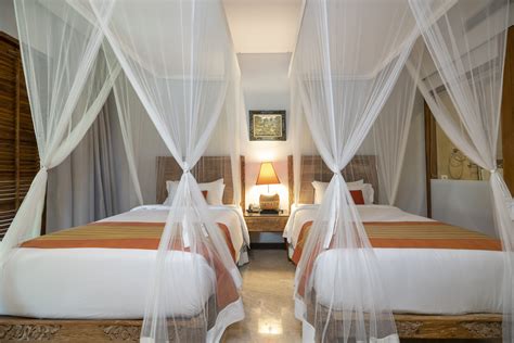 DELUXE ROOM WITH BALCONY - Adiwana Svarga Loka