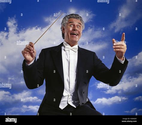 Conductor with baton hi-res stock photography and images - Alamy