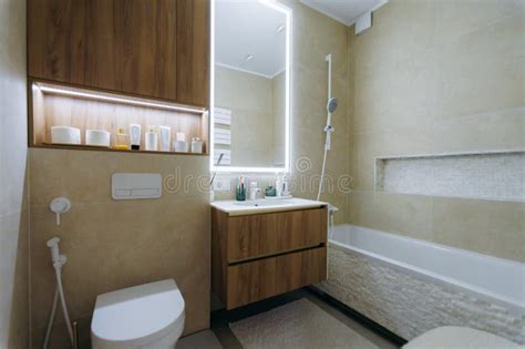 minimalist bathroom  marble tiles  warm ambient lighting stock