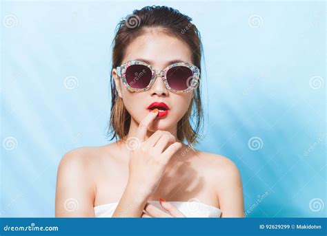 Colorful Portrait Of Young Attractive Asian Woman In Dress Stock Image