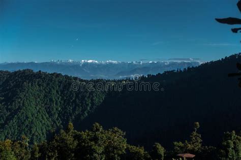 A Distant Panoramic View Of Snow Covered Gomukh Glacier Mountain Peaks