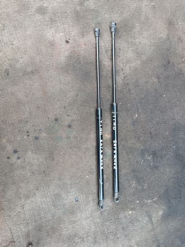 Амортизатор крышки баг для Ниссан Альмера тино