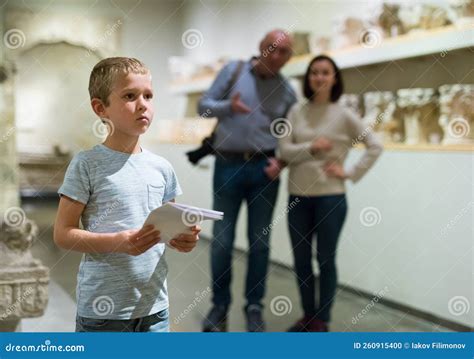 Family visiting museum stock photo. Image of gallery - 260915400