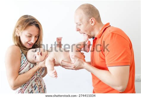 Happy Parents Holding Naked Baby Boy Stock Photo Shutterstock
