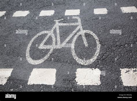 Bike Lane Symbol on Street Stock Photo - Alamy