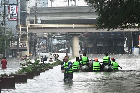Stranded commuters, motorists endure Metro Manila's floods