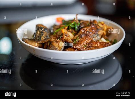 A Plate Of Delicious Chinese Home Cooking Braised Mackerel Stock Photo